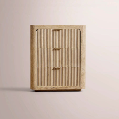 Wooden cabinet with three drawers on a beige background