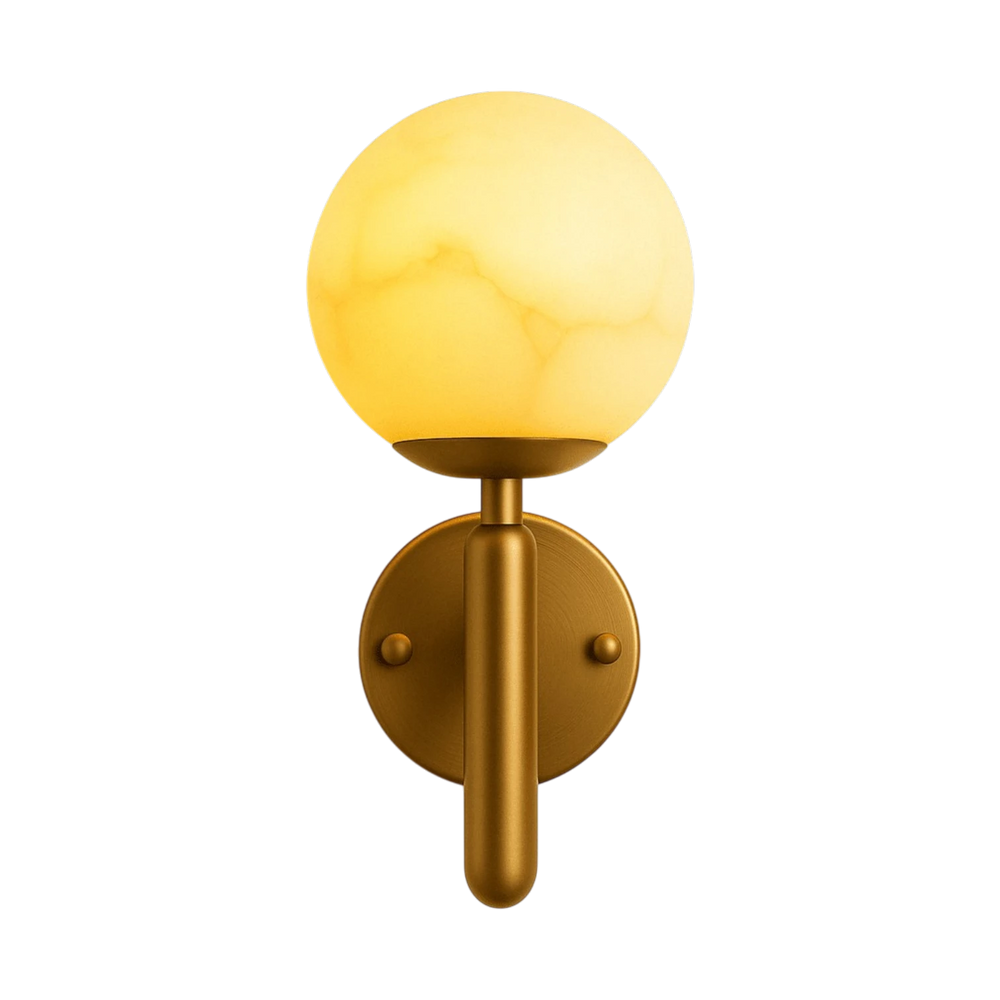 Gold wall sconce with a yellow glass shade on a white background